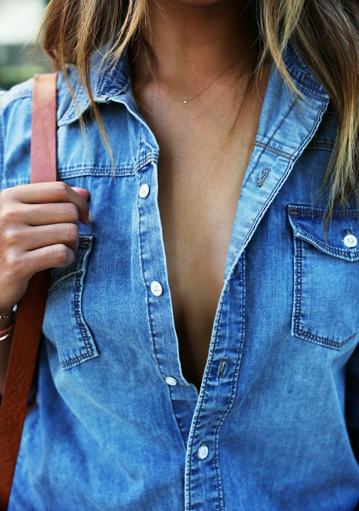 unbuttoned denim shirt